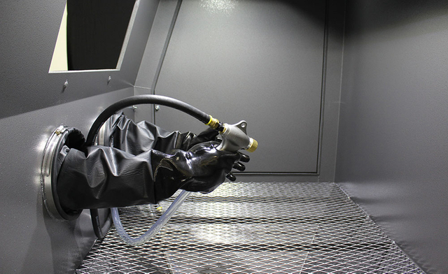 Sand blasting center