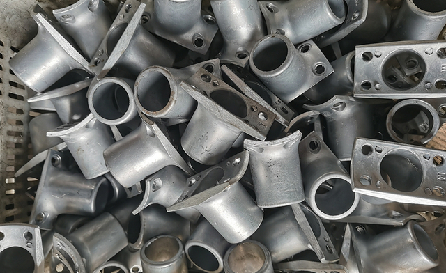 Vibratory grinding parts