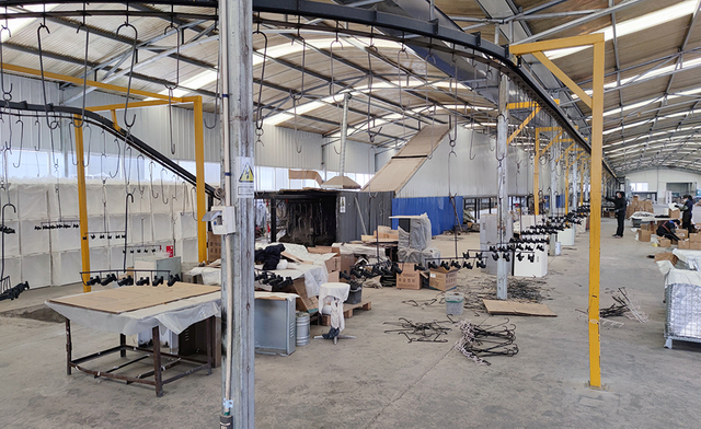 Electrostatic powder coating center